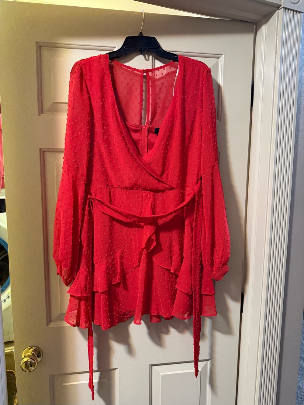 B. Smart Red Swiss Dot Wrap Tunic with Ruffle Hem